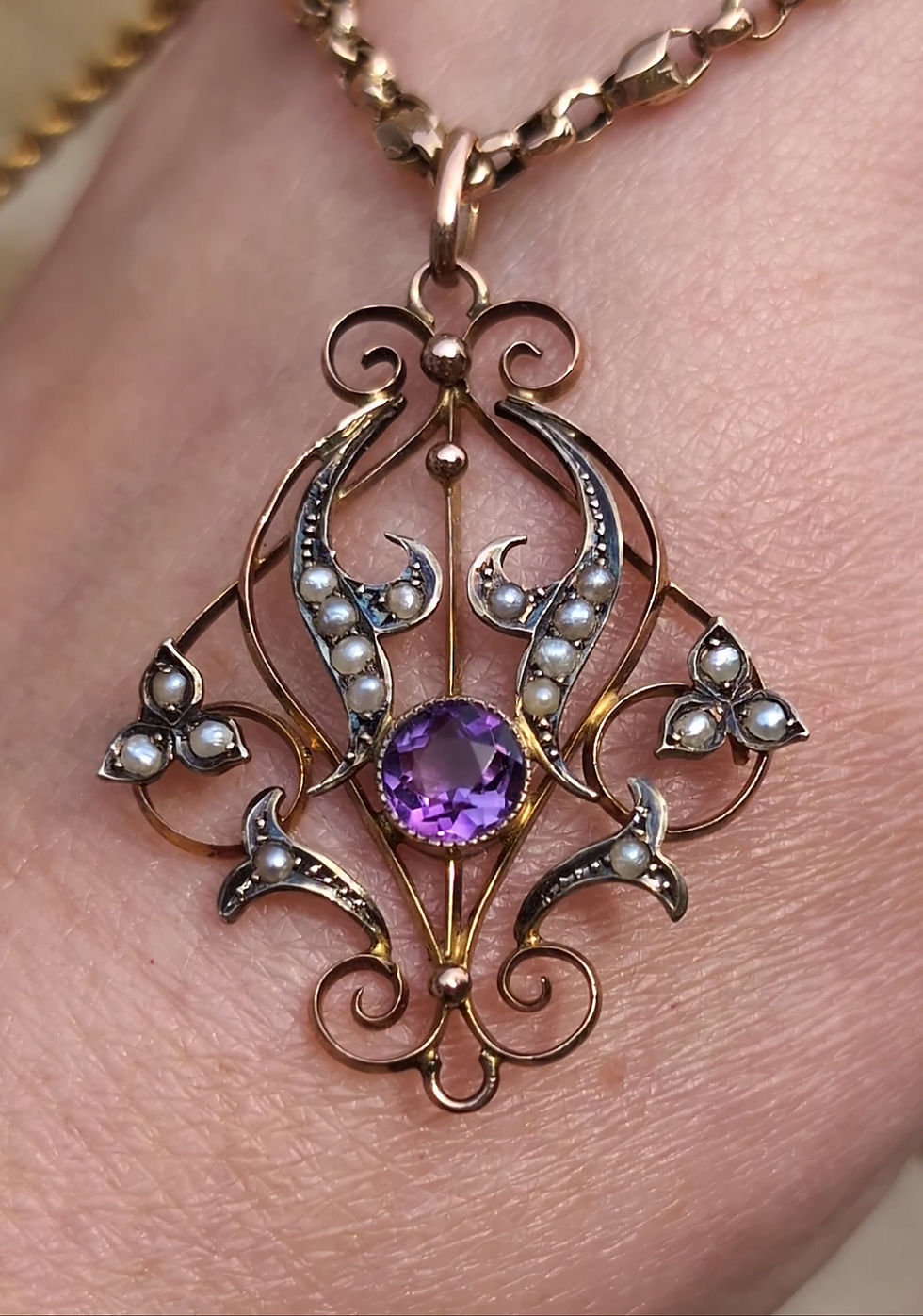 Thumbnail: Antique Art Nouveau Lavaliere Pendant in yellow gold, ornate swirling design set with amethyst and seed pearls