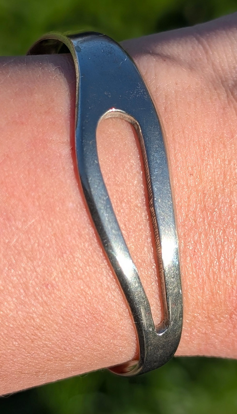 Thumbnail: vintage silver cuff with a cutout design