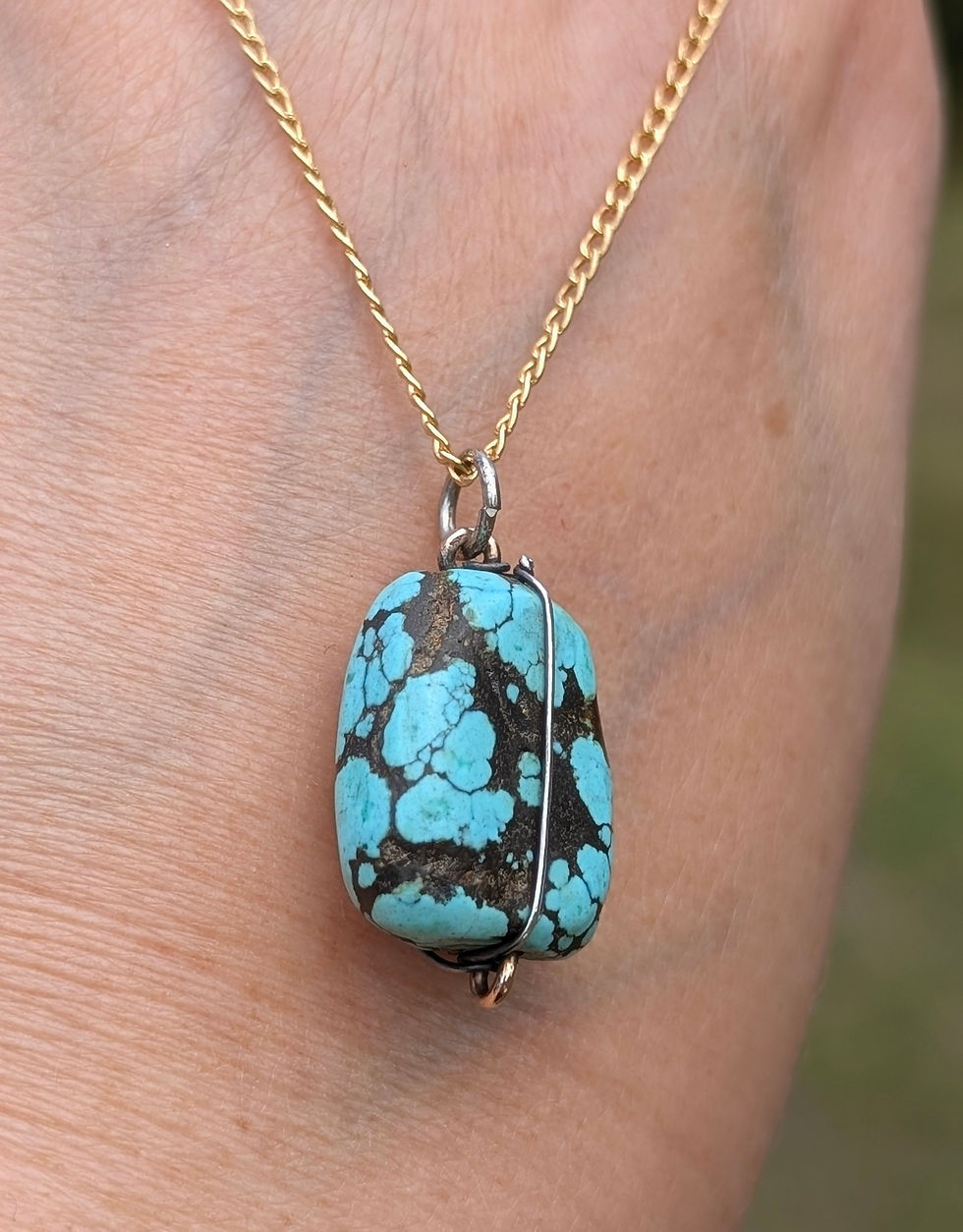 Thumbnail: a large veined piece of turquoise pendant