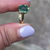 Thumbnail: vintage yellow gold ring with large cushion cut green zircon