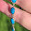 Thumbnail: vintage articulated silver bracelet with oval cabochons of turquoise