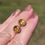 Thumbnail: 1960s oval faceted citrines with a deep golden colour bezel set in yellow gold stud earrings