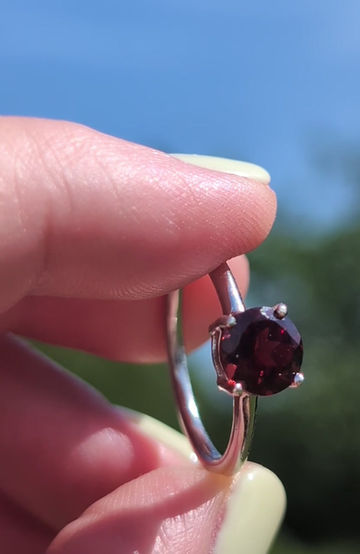 Thumbnail: Garnet solitaire silver ring