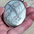 Thumbnail: a Large Victorian oval shaped silver Locket engraved with buckle or garter design