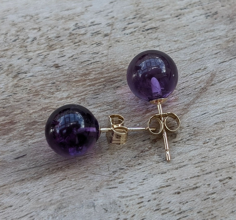 Thumbnail: purple spheres of amethyst and yellow gold stud earrings