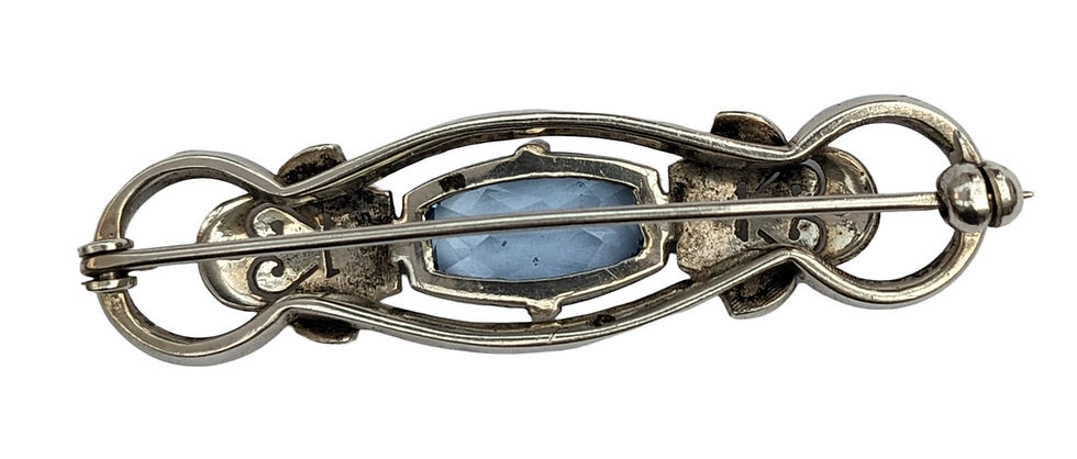 Thumbnail: Antique art deco silver bar shape brooch set with a large vivid blue spinel