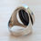 Thumbnail: large vintage sterling silver ring with oval cabochon of black onyx