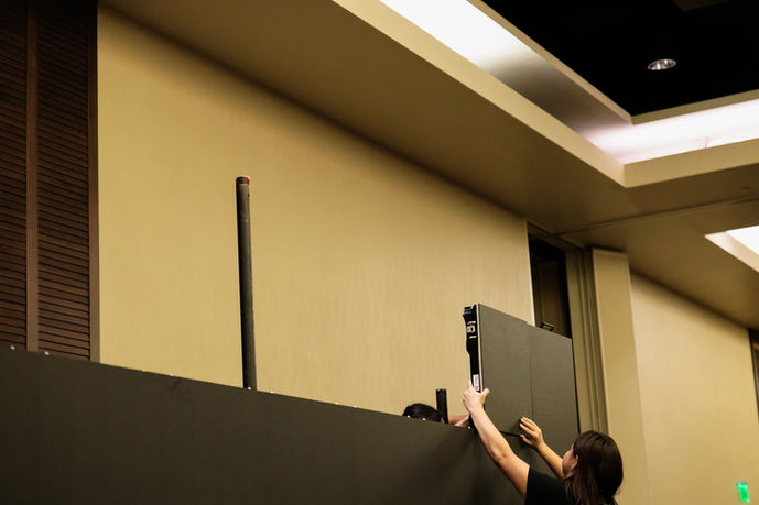 AV tech setting up a LED Wall