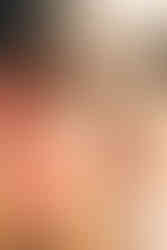 Mother and daughter looking at shell at Emu Park beach, taken during a family photoshoot with Sarah Joy, a Rockhampton Family Photographer