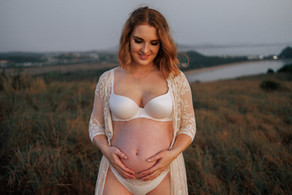 Solo maternity image at sunrise on Kemp Hill – Rockhampton region