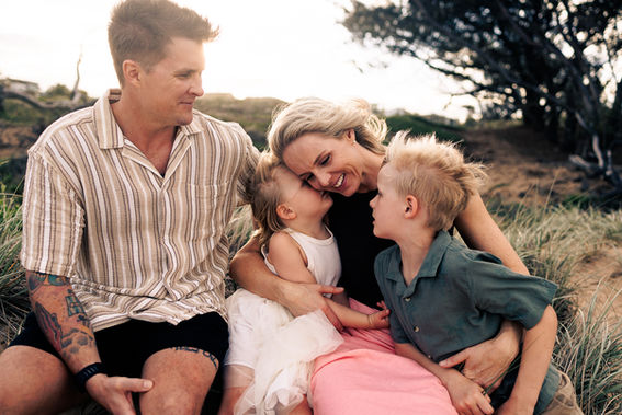 Family at golden hour at Emu Park beach during outdoor family photography session with Sarah Joy Rockhampton family photographer