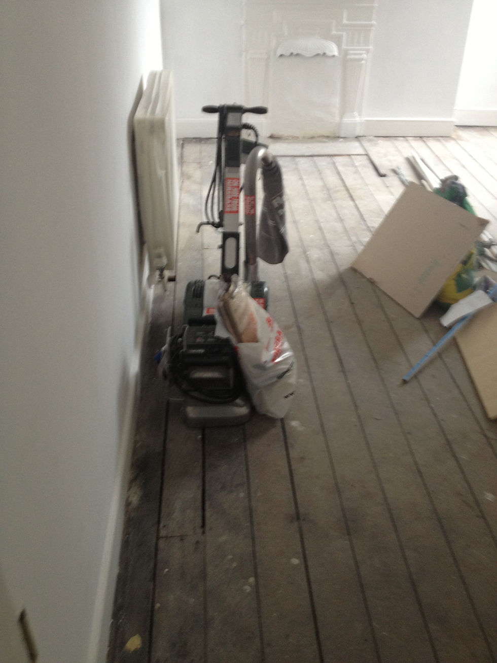 Floor boards before repair work