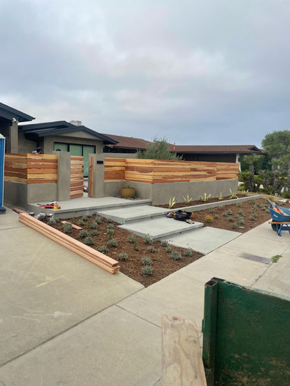 Modern Concrete Driveway & Horizontal Wood Fence - Photo 7