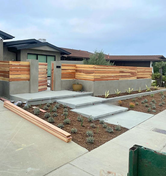 Project Nava Modern Entrance Made of Concrete and Horizontal Wood Fence