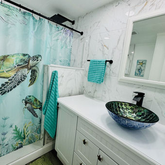 Mobile Home Bathroom Remodelling. Tub to shower conversion, complete demolition, tile installation, vanity replacement, toilet replacement, faucet replacement