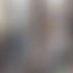 Woman lifting dumbbells in gym