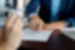 closeup-financial-advisor-pointing-place-signature-contract.jpg