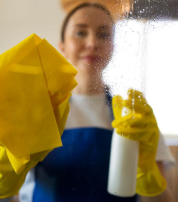 professional-cleaning-service-person-cleaning-office-window.jpg