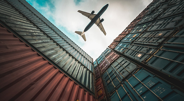 freight-airplane-flying-overseas-shipping-container.jpg