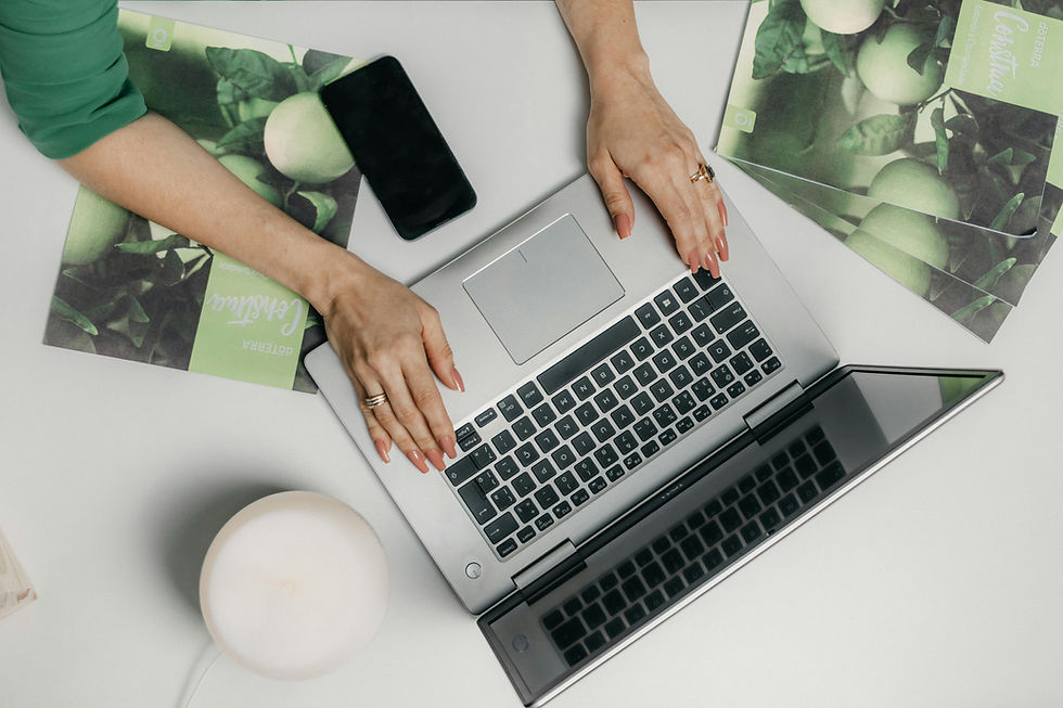 women on designing on laptop