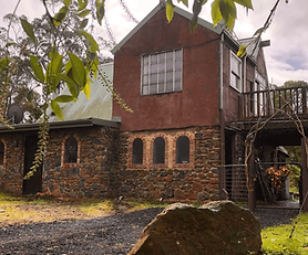 Unique Permaculture Property with Volcanic Rock Home, Tiny Houses, Solar & Established Gardens – Carpendeit, Victoria