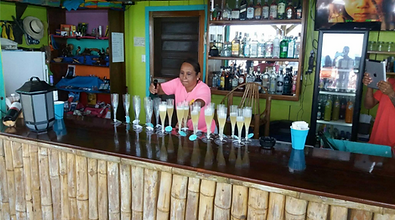 Champagne pouring at the Black Pearl Restaurant & Bar on King Lewey's Island Resort, Placencia Belize