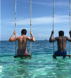 belize-island-sea-swing