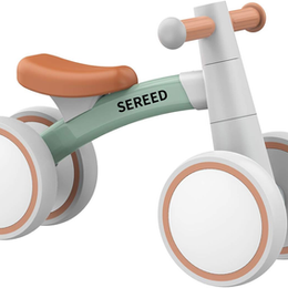 3D render of a white and mint-green children’s tricycle with brown seat and wheels, labeled SEREED on a white background