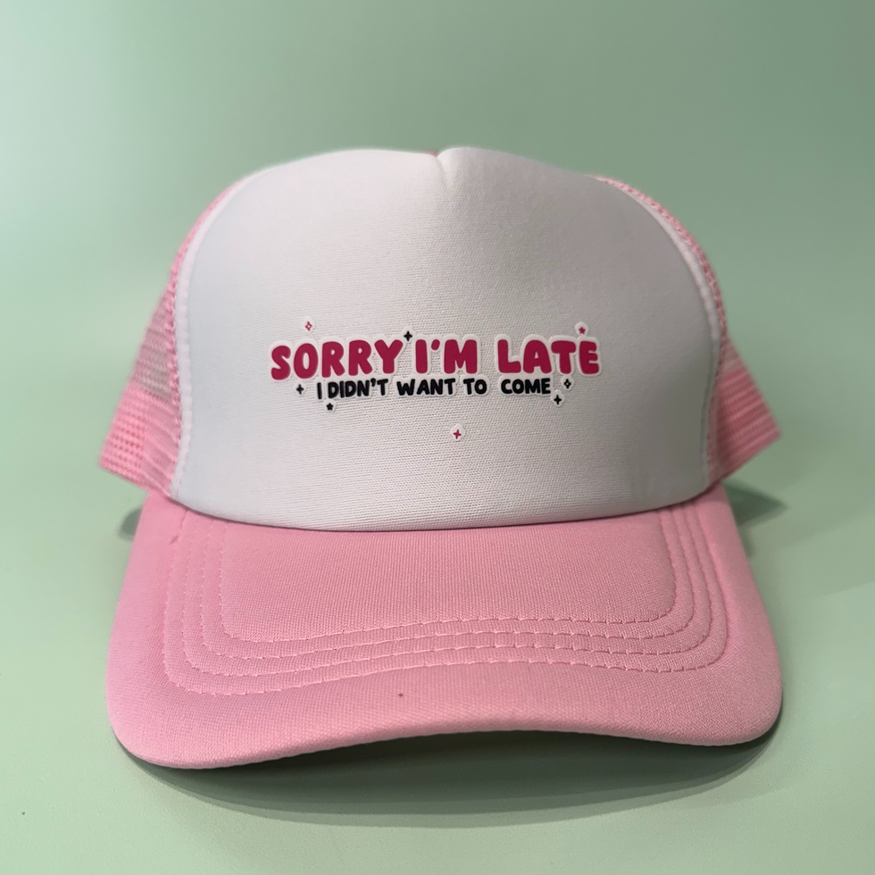 Thumbnail: pink and white trucker cap with the text "sorry im late, i didnt want to come" on the front