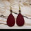 Miniature : Boucles d'oreilles avec cuirette bourgogne, pierre de lave et crochet doré