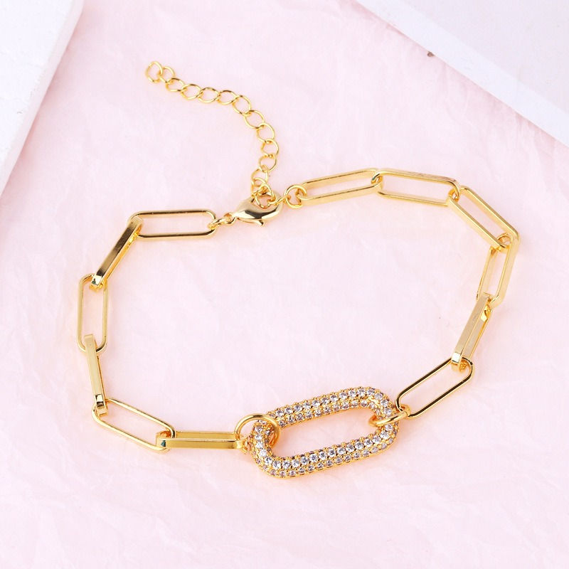 Thumbnail: Interlocking diamond bracelet and necklace collection