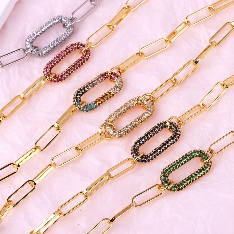 Thumbnail: Interlocking diamond bracelet and necklace collection