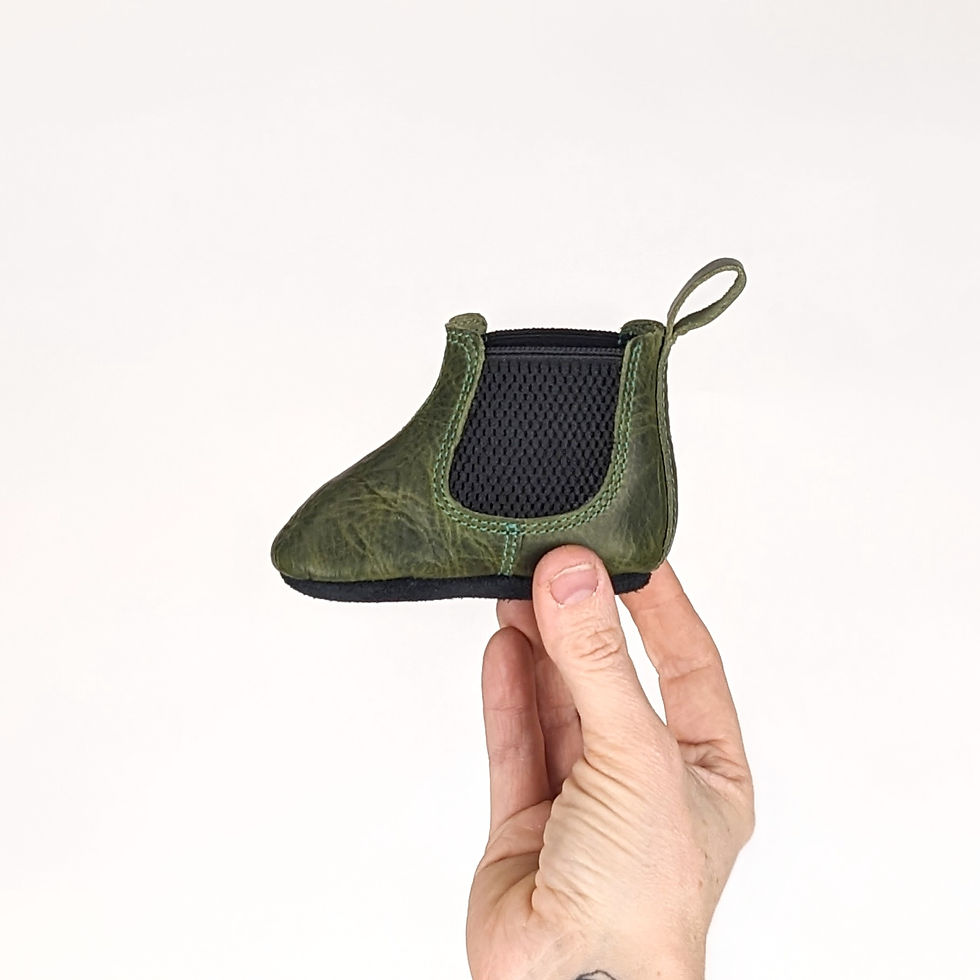 Thumbnail: Handmade leather Chelsea boots for babies in an olive green colour. 