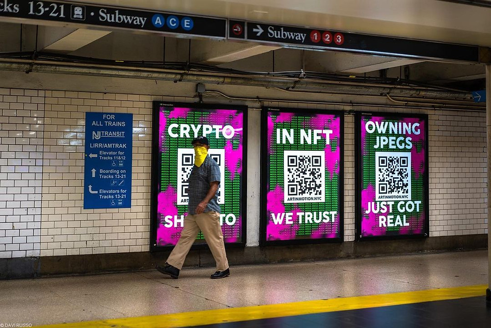 subway posters with QR codes on them and the phrases 'In NFTs we trust, owning JPEGS just got real and Crypto Shmypto'
