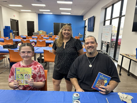 Kiwanis Club of the Las Vegas Strip volunteers preparing donated books with Spread the Word Nevada in September 2026