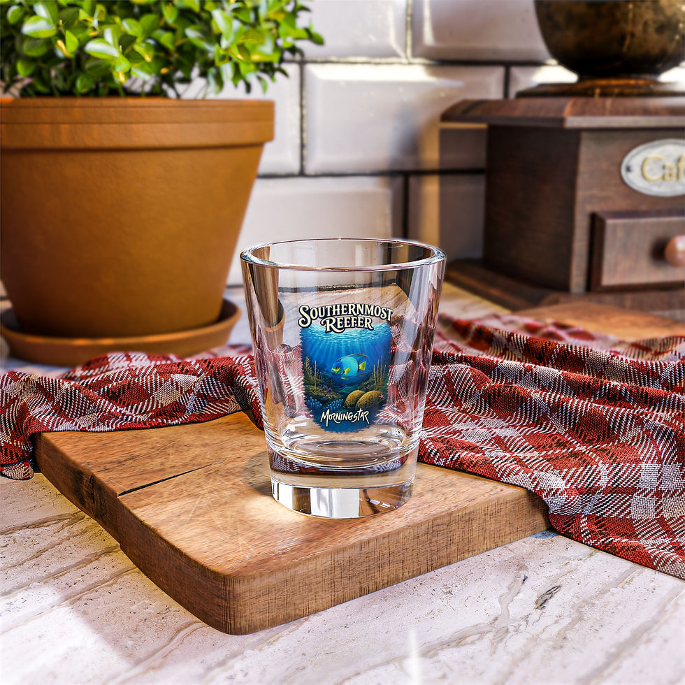 Collectible Southernmost Reefer Series 1st Edition shot glass with colorful tropical reef artwork by Ken Morningstar, crafted