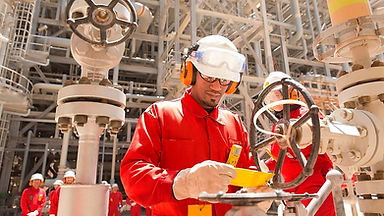 worker-checking-a-valve.jpeg