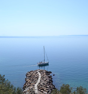 A ship sailing at sea, representing the first step toward a new direction through life coaching