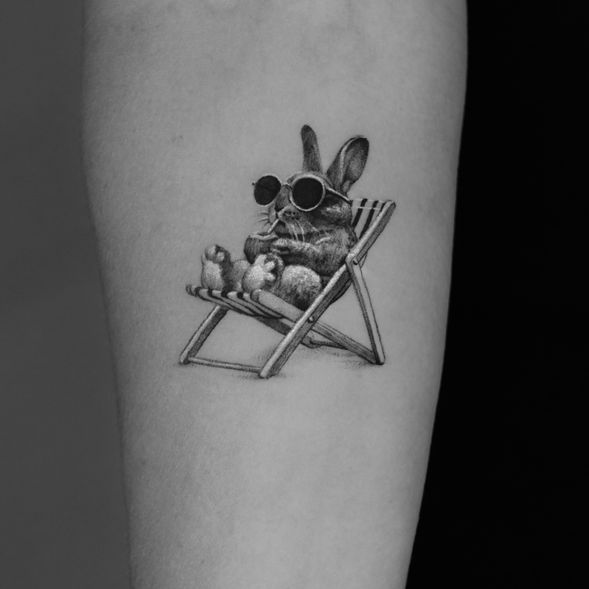 small animal realism tattoo in amsterdam