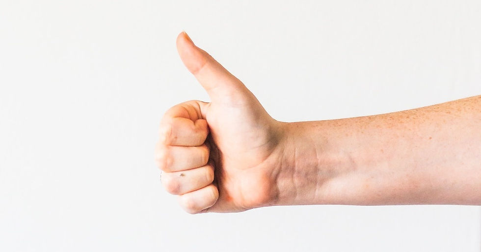 Hand giving thumbs up