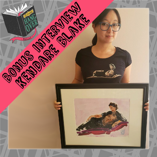 Kendare holding artwork featuring Jeff Goldblum