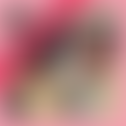 Kendare Blake posing with a giant weapon