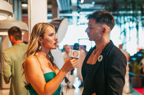 A photo of Sebastian Dalla Ba being interviewed at the WCS Awards 2025 Pride Gala in Barcelona