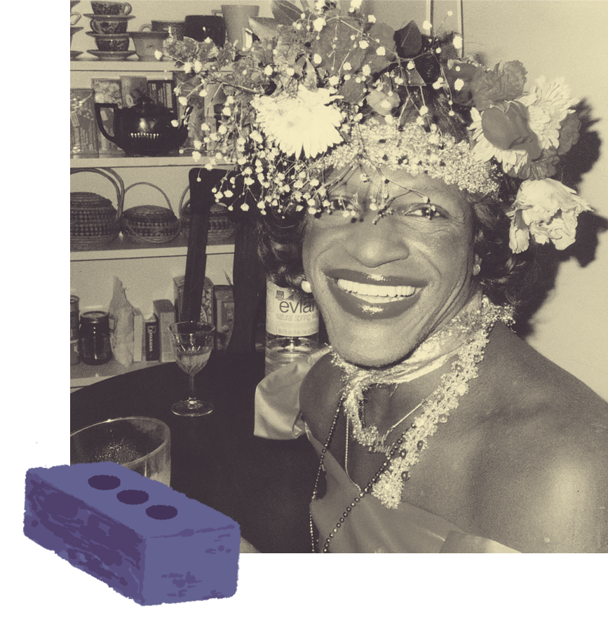 A black and white photo of Marsha P. Johnson. She has dark skin and hair and is smiling. She is wearing a large flower crown that partially obscures her face, an off the shoulder dress and various necklaces. Overlaying the image there is an illustration of a brick.