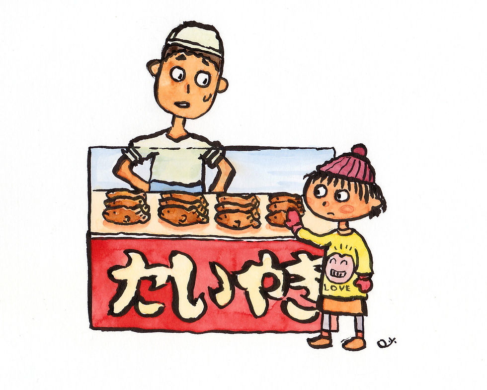 たいやきをじっと見ている女の子