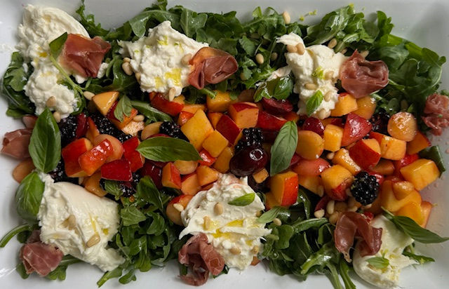 Peach and buratta salad with hot honey dressing
