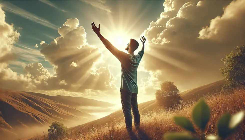 wide angle image of a man holding his hands up in worship
