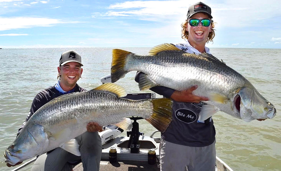 Never far from the big girls, Shaun Stringer (left) with his 101cm barra and Sam Chambers with his 114cm stonker share some double hook-up madness.