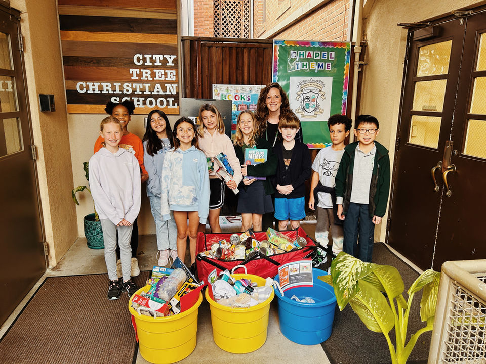 class bringing donations to organize and distribute