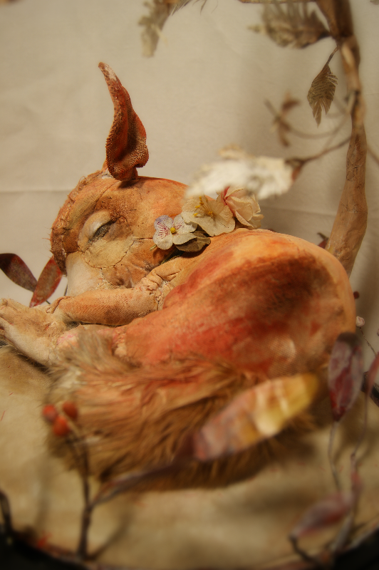 textile art fox with an antique glas